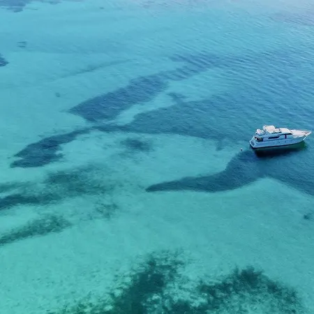 Isa-apartments With Air Conditioning And Private Outdoor Space In * San Teodoro (Sardinia)